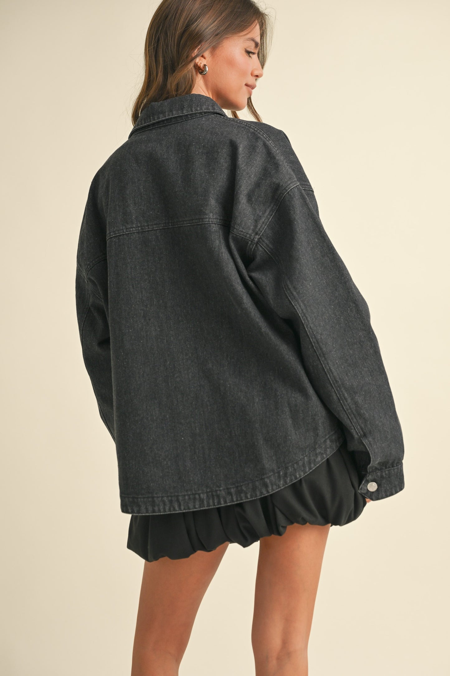 the black denim jacket